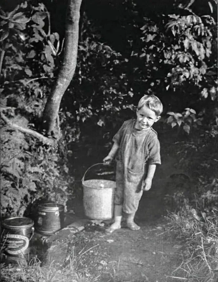 A Mountain Boy Fetches Water From A Spring, Great Smoky Mountains, Sevier County, Tennessee, Ca. 1950