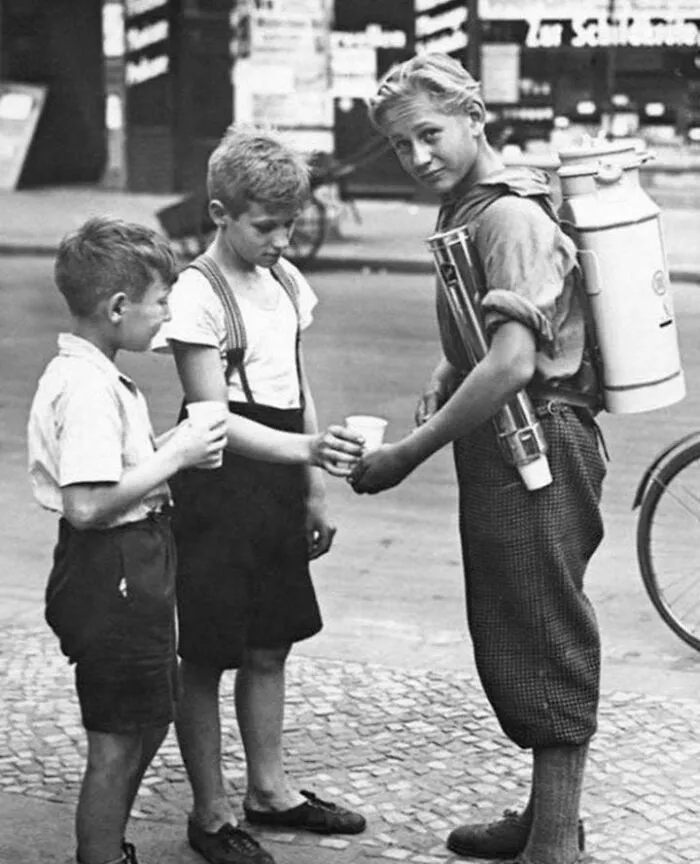 A Boy Selling Lemonade With A Portable Lemonade Dispenser. Berlin, 1931