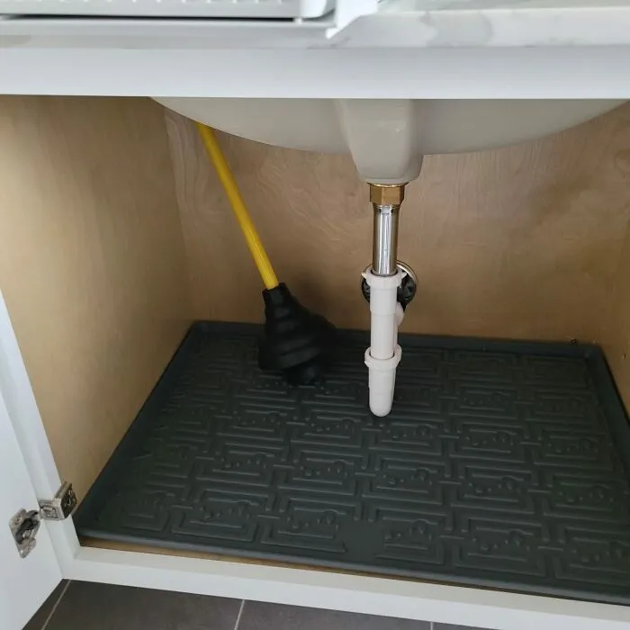 Protect Your Cabinets And Peace Of Mind With This Genius <a Style="Display:inline;" Href="Https://Www.amazon.com/Xtreme-Mats-Under-Kitchen-Cabinet/Dp/B00hfxmh6k?ie=utf8&linkcode=ll1&tag=bpwasp-20&linkid=ab437418b444e7aad48ed456a58f0c8b&language=en_us&ref_=as_li_ss_tl" Target="_blank"><span Style="Font: Inherit; Color: #d74b1f;"> Waterproof Under Sink Mat </Span>. Spills And Leaks Don't Stand A Chance Against This Absorbent, Waterproof Wonder