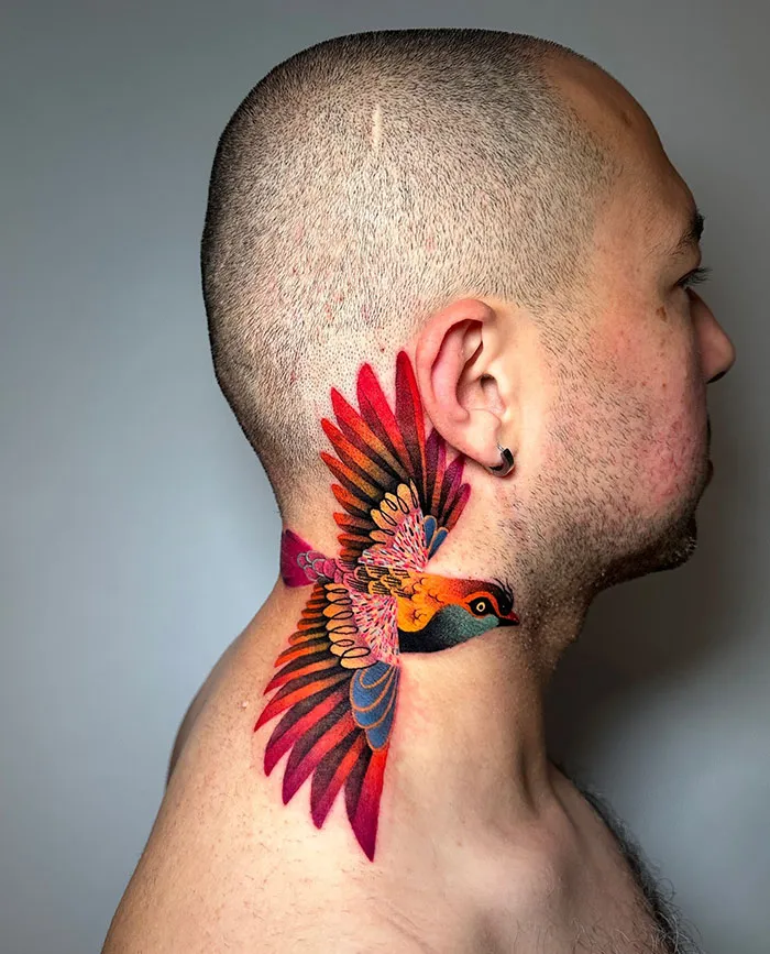 Colorful Bird Arm Wrap Tattoo