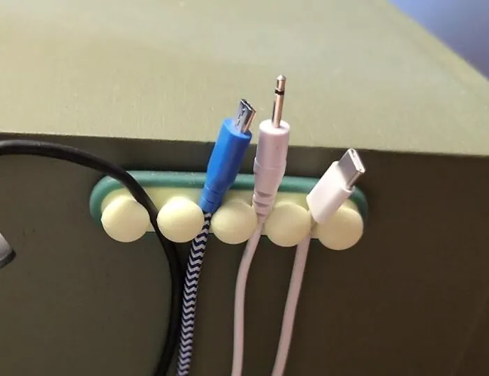  This   <a Style="Display:inline;" Href="Https://Www.amazon.com/Coocat-Organizer-Management-Workbench-Nightstand/Dp/B09zgywp38?ie=utf8&th=1&linkcode=ll1&tag=bpsquirrel-20&linkid=a9fe0c844ba031a68cd3452f3435fd75&language=en_us&ref_=as_li_ss_tl" Target="_blank"><span Style="Font:inherit;color:#d74b1f;"> Silicone Cable Organizer</Span> Sticks To The Side Of Your Desk, Keeping Your Wires From Getting Crossed