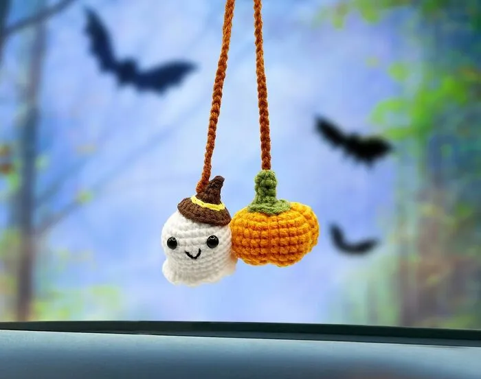 Your Rearview Mirror Just Got A Boo-Tiful New Friend With This   <a Style="Display:inline;" Href="Https://Www.amazon.com/Crochet-Hanging-Accessories-Halloween-Handmade/Dp/B0c94j3dvv?crid=1tjxcv3c2vnr5&dib=eyj2ijoimsj9.qxieloojnqux_to4n-7zxxuxfs1auss5vgsccftzcnx-4xmmsrne4poqalwpts8_lwyvr0ebpjyzz6hixvtv-_yooxbrkgkzcbloeg_pmyepyg-Iccgxknt2go_pdwghuihosvnewp2xwc7xzcbei8ntxqmub8ek0azpnrzy7ds8jc9v4koqwnvlzchk5s_b61-Whl3-Vol3vpxknzyemcd3zhbzkwaqlv--Zxbcvupegk-Blodpq1bpgpgcjgt6be-Kk_f4lpcpraghs5xgxgnnnzlxjxoezvzxskt_emq.vt-C-8ilosuxtbtm2q_qo30gnpptf2-Wsidek5xzmik&dib_tag=se&keywords=halloween%2bcar&qid=1728550344&sprefix=halloween%2bcar%2caps%2c207&sr=8-199-Spons&sp_csd=d2lkz2v0tmftzt1zcf9tdgy&th=1&linkcode=ll1&tag=bpworm-20&linkid=22888e9c83a56ad641933fd7c172d249&language=en_us&ref_=as_li_ss_tl" Target="_blank"><span Style="Font: Inherit; Color: #d74b1f;"> Crocheted Ghost And Pumpkin Duet </Span> That's Hanging Around To Bring Some Spooky Charm To Your Daily Drive