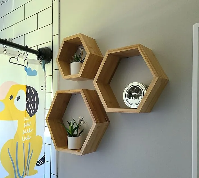    <a Style="Display:inline;" Href="Https://Www.amazon.com/Bamboo-Hexagon-Floating-Shelves-Decor/Dp/B09wjnx4zy?crid=2m7wjt7kizv7p&dib=eyj2ijoimsj9.fqltqzfkcostg7fylhsirrjrfhpbfn5zfepxtyqxv4lf7ns3rawzsbwqqocwh6lsnozygio_6ixtsqw9wpx7ogxl1ldfce9a4txml17cfb5kkw6orsr9wac29pe1e3rneaskactodm2rikw7x_f3rntdu7hklofmyjbavnpmnzrvqkzxzvgeaqk1qhyzwo0efceuflzprnf1fygkpinrblwun2omm5cp1eldomunxo998bmlq6inzh3nbqqs4qbxjxldbm1mefy6j60kwjgorlfcvkb2mgaux1kei1pvjjm.ylnicetuf4vefklshf52gycrebqobmxrdaq50x9vxva&dib_tag=se&keywords=sustainable+home+decor&qid=1728284738&sprefix=sustainable+home+deco%2caps%2c218&sr=8-23&linkcode=ll1&tag=bpwolf-20&linkid=8913f7c276c8623b9dd95c1989456147&language=en_us&ref_=as_li_ss_tl" Target="_blank"><span Style="Font:inherit;color:#d74b1f;">  Hexagon Bamboo Floating Shelves</Span> Bring An Unexpected Angle To Your Decor