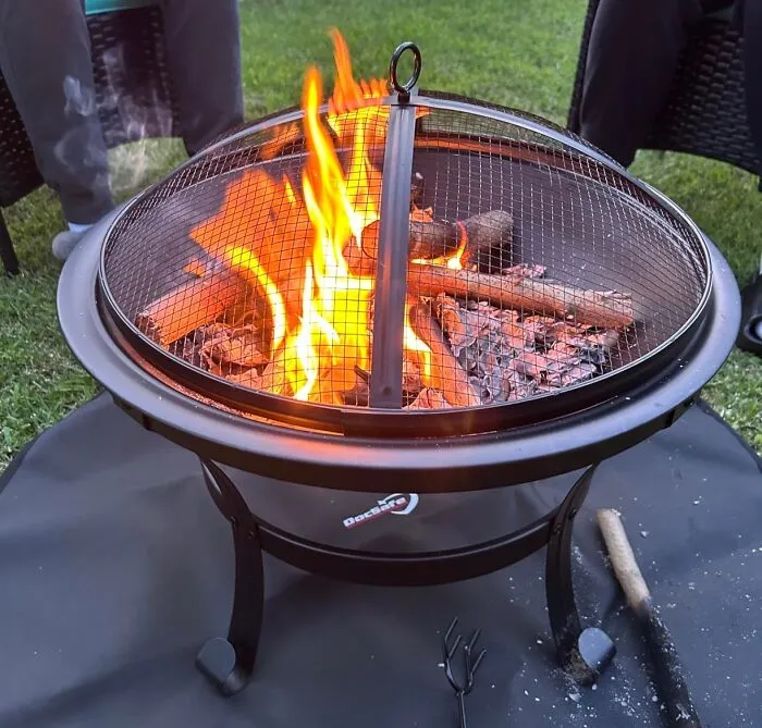 Gather 'Round The   <a Style="Display:inline;" Href="Https://Www.amazon.com/Outside-Outdoor-Burning-Bonfire-Backyard/Dp/B09dcwdw6d?crid=2ii84tocwsjzn&dib=eyj2ijoimsj9.wpdbc64lloqwgnmqcrhq3z23spokk_zssfyulpsldnachilzufte1wpjxoxcrwjdewy7m7j-Z0_m1rtpzchbze-Ahtwfc0zowxm5bj3e2q9uti1j1vuw-Qjem0nlf_o-0nre1uy_fqhumbzr1gnqkg5reldrjzapn-Iqsek7olhmbnt5ty3bvdd88pdshpxigysffa2oimwzt_mwpg2sfa_jrnjtiakcvpr0_eubm3ktf9ayjlfyz0yesb3zio8if-W6apr-P5crn3xy6wyguvscmrqzcgdth-Kycc5zklc.lyi9plpxoxy5mb34omg7b6h0vf2p-98dc5xklxge9iy&dib_tag=se&keywords=fire%2bpit&qid=1728561687&sprefix=fire%2b%2caps%2c210&sr=8-3-Spons&sp_csd=d2lkz2v0tmftzt1zcf9hdgy&th=1&linkcode=ll1&tag=bpcamel-20&linkid=fb4d6a3d455f0d5d46b8bf2ad76f8d5b&language=en_us&ref_=as_li_ss_tl" Target="_blank"><span Style="Font: Inherit; Color: #d74b1f;"> Fire Pit For Outdoor Wood Burning </Span> And Let The Warmth And Good Times Ignite