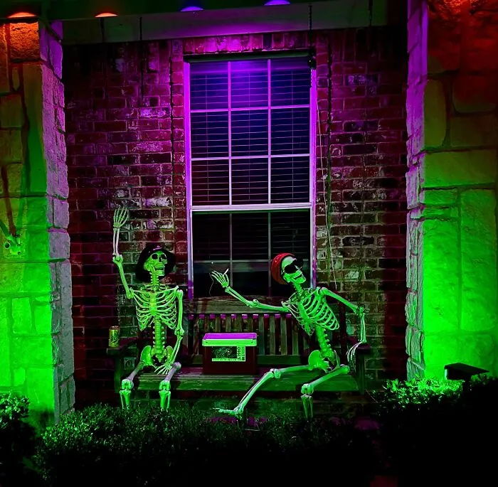 Neighbor Got The Giant Skeleton, These Guys Are Waving To It