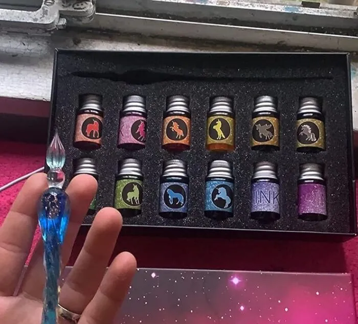 Scribes And Scriptors, Indulge In The Luxe Writing Experience Of Yesteryear With This Sumptuous   <a Style="Display:inline;" Href="Https://Www.amazon.com/Mancola-Set-Rainbow-Signatures-Calligraphy-Decoration/Dp/B081l9c7dr?crid=3p6drhqksiv0c&dib=eyj2ijoimsj9.7ydatyqydgsi1rsjxgzh1edyld7nfkx_zenstil6-Pjqvpmlomsbm6ods-Nb0bxujduuexn7j0vskcy1gcqkk1axbfo4abeoszvqix0dfglaw7f0xbvkbxkfbrtfng9hbqk-26pnbpj9tfcchbqhvnfgiqb1sm4cor9kxf4gvbvsdismwldgulabbqyjdmte3b-Oeqkpratrsvdh2fj9z8bipki7wlnykhok-Fok7qbdafpte6gjtvuwuaeb8qxjam_a7snlpv-8ix43ohljtqhpqduovxhi4cyv6tzsokc.sh3561tghpjdkp871sezw88nd1g5l6rmie8gsv4_kaq&dib_tag=se&keywords=gifts+for+artists&qid=1710833116&sprefix=gifts+for+art%2caps%2c234&sr=8-118&linkcode=ll1&tag=bphamster-20&linkid=39d0713699697d6e5d234c6afcf9f528&language=en_us&ref_=as_li_ss_tl" Target="_blank"><span Style="Font: Inherit; Color: #d74b1f;"> Glass Dipped Pen Ink Set </Span> - A Stroke Of Elegance On Every Page