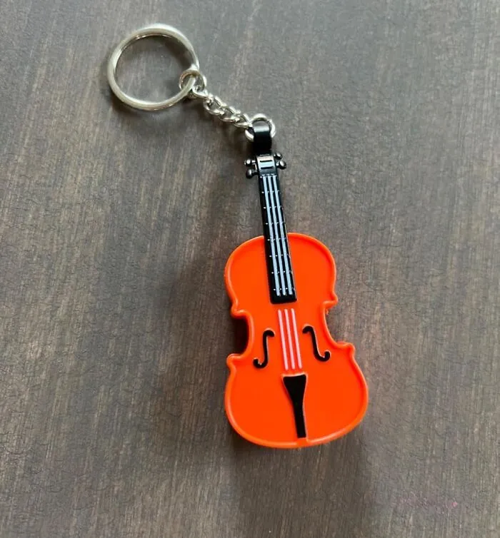 Play A Tiny, Impeccable Note Of Sympathy For A Friend With The <a Style="Display:inline;" Href="Https://Www.amazon.com/Munnygrubbers-Smallest-Keychain-Playable-Condolences/Dp/B08fjdddyr?ie=utf8&linkcode=ll1&tag=bpapple-20&linkid=d019f688408388acc02ae74a9b2f696c&language=en_us&ref_=as_li_ss_tl" Target="_blank"><span Style="Font: Inherit; Color: #d74b1f;"> World's Smallest Violin Keychain</Span>