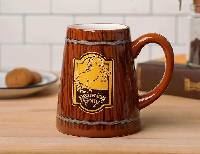 Raise A Mug Of Fine Ale And Toast To The Warm Hospitality Of Bree's Most Famous Inn With The <a Style="Display:inline;"Href="Https://Www.amazon.com/Silver-Buffalo-Prancing-Ceramic-Sculpted/Dp/B09svsrx7g?ie=utf8&th=1&linkcode=ll1&tag=bppear-20&linkid=e9b800cffbf944226ff2deab0e39334e&language=en_us&ref_=as_li_ss_tl" Target="_blank"><span Style="Font: Inherit; Color: #d74b1f;"> Prancing Pony Mug</Span>