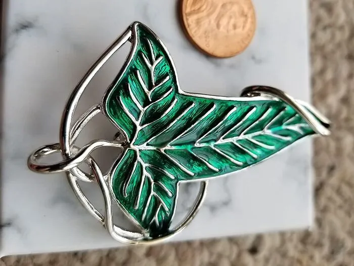 Adorn Yourself With The Symbol Of The Elves' Eternal Connection To Nature With The <a Style="Display:inline;"Href="Https://Www.amazon.com/Bahamut-Christmas-Elegant-Necklace-Backpack/Dp/B09h27xmgz?ie=utf8&th=1&linkcode=ll1&tag=bppear-20&linkid=fee88f9e0f2a0635148d320296350171&language=en_us&ref_=as_li_ss_tl" Target="_blank"><span Style="Font: Inherit; Color: #d74b1f;"> Elven Green Tree Leaf Enamel Pins</Span>