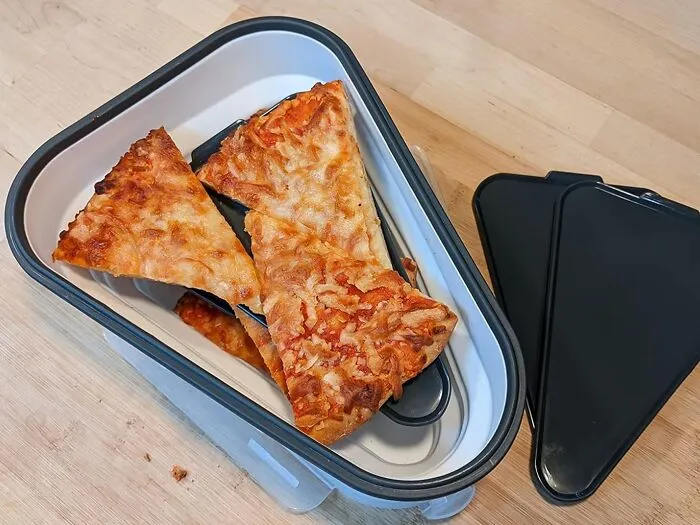 Save Those Savory Slices From The Holiday Party! The <a Style="Display:inline;" Href="Https://Www.amazon.com/Perfect-Pizza-Pack-Microwavable-Adjustable/Dp/B09r1b28c6?ie=utf8&linkcode=ll1&tag=bpgrape-20&linkid=d7136597d810fae0a7d1771f4e793f1e&language=en_us&ref_=as_li_ss_tl" Target="_blank"><a Style="Display:inline;" Href="Https://Www.amazon.com/Perfect-Pizza-Pack-Microwavable-Adjustable/Dp/B09r1b28c6?ie=utf8&linkcode=ll1&tag=bpgrape-20&linkid=d7136597d810fae0a7d1771f4e793f1e&language=en_us&ref_=as_li_ss_tl" Target="_blank"><span Style="Font: Inherit; Color: #d74b1f;"> Triangular Collapsible Pizza Slice Storage Container</Span> Is A Holiday Leftover Hero, Allowing You To Store And Transport Individual Slices Of Leftover Holiday Pizza, Keeping Them Fresh For A Quick Boxing Day Snack Or New Year's Eve Munchi
