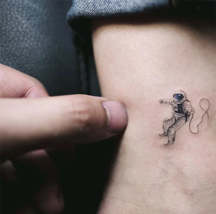 Small Astronaut Tattoo