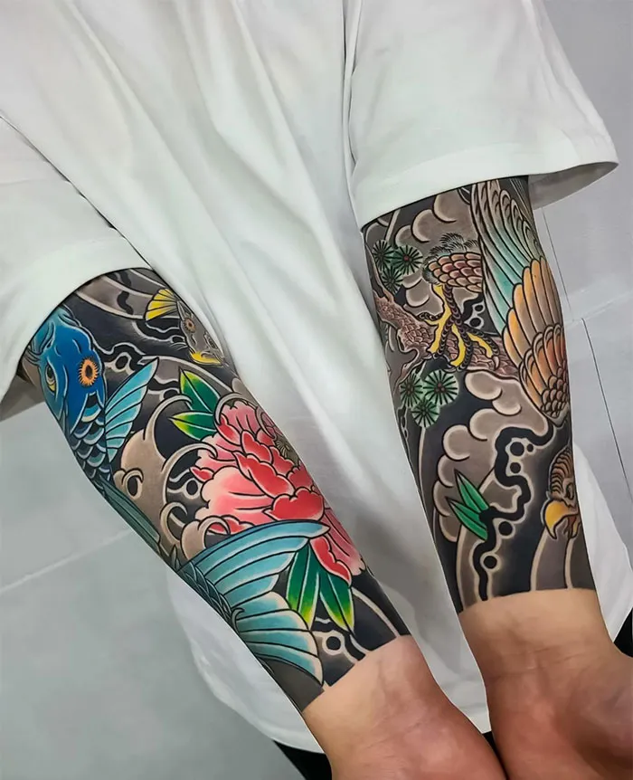Colorful Koi And Floral Forearm Tattoo