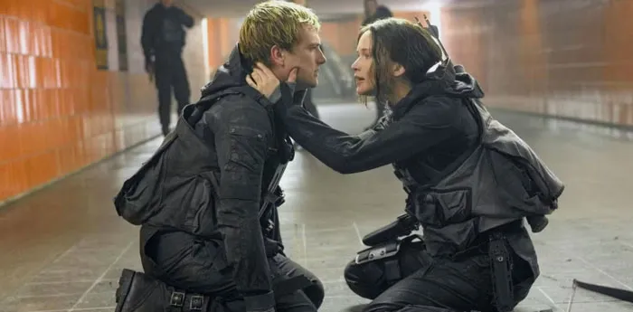 Two characters in tactical gear face each other in a dramatic scene, representing iconic duos.