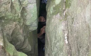 "Lucky" Woman Trapped Upside Down For 7 Hours Between Boulders After Trying To Recover Her Phone