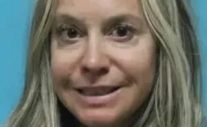 "Lock Her Up": Teacher Grins In Mugshot After Physical "Affair" With 15YO Boy Lands Her In Jail