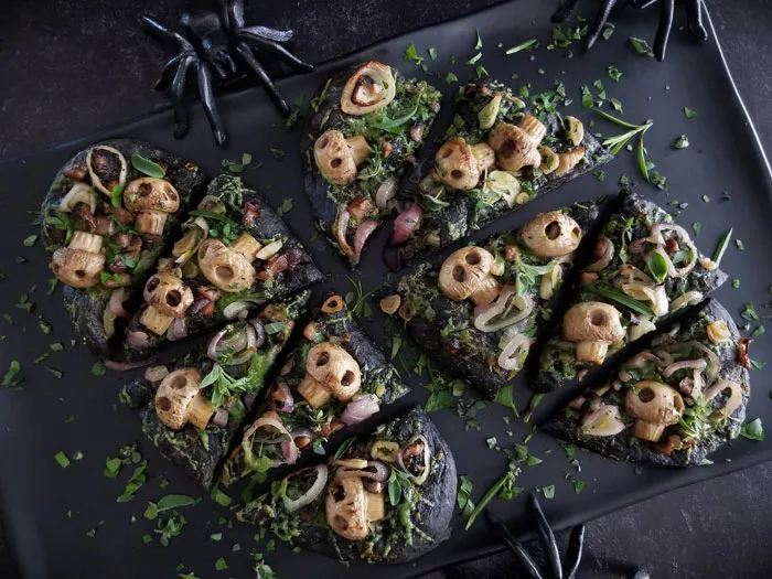 Gorgeously Spooky Bread Of The Dead, Made With A Delicious Homemade Squid Ink Flatbread Topped With Adorable Mushroom Skulls