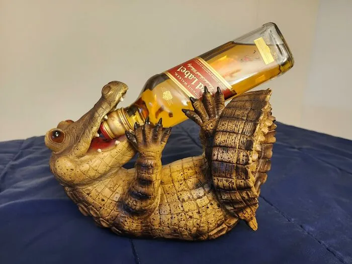 Who Needs A Sommelier When You Have This Guy? This   <a Style="Display:inline;" Href="Https://Www.amazon.com/Products-Standard-Hand-Painted-Countertop-Alligator/Dp/B001az2wza?crid=1b10fl1ene14f&dib=eyj2ijoimsj9.mq7nlgvppfqwjdvhi8c05pcrci3ne0ugugrqxoepmg64de-Fzwjnp4naoe-Szxay2ru1fu4gvoa5zueirkk7wev0trcqsiggdqiz8e1j60slymsjkotzxhhvzl3_6s63pgyl3jod94jqg3_actxcnuswnm65i1wqljsarwktghzuekpendjvc7xhm4mhlvaet1k5cgaxs-Phtauzhw1hgalebdixlw9uwudl_4if0uoy_blhf2py3lcdwrzoagwtcr2mck_m5mypovspo2sracsme0mggfcea6zoclasf7m.b62rxgtlnilpb8of8cjbr60-Dfqkarch7g131udlbkc&dib_tag=se&keywords=alligator%2bgreater&qid=1728465564&s=home-Garden&sprefix=alligator%2bgreate%2cgarden%2c177&sr=1-11&th=1&linkcode=ll1&tag=bpgiraffe-20&linkid=6211eb035bf0490af3b9b02da91069ed&language=en_us&ref_=as_li_ss_tl" Target="_blank"><span Style="Font: Inherit; Color: #d74b1f;"> Crocodile Wine Stand</Span> Will Guard Your Wine With His Life (Or At Least Until You're Ready To Pour A Glass)