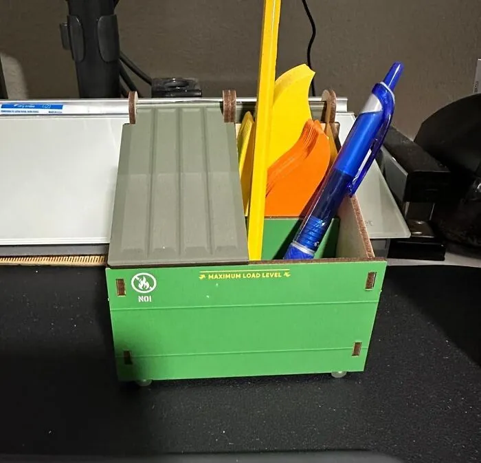 Trash Your Old Pen Holder And Upgrade To The <a Style="Display:inline;" Href="Https://Www.amazon.com/Genuine-Fred-Dumpster-Assorted-5280917/Dp/B08vn8vtqq?ie=utf8&th=1&linkcode=ll1&tag=bpmelon-20&linkid=45ce8f7a682c522401d8408348ff0556&language=en_us&ref_=as_li_ss_tl" Target="_blank"><span Style="Font: Inherit; Color: #d74b1f;"> Dumpster Pen Holder</Span>, A Hilariously Bleak Way To Store Your Writing Utensils