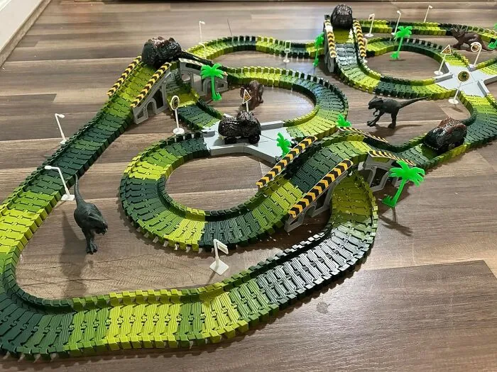 Roar Into The World Of Prehistoric Racing With The <a Style="Display:inline;" Href="Https://Www.amazon.com/Dinosaur-156pcs-Create-Flexible-Playset/Dp/B07s6fdhpn?ie=utf8&th=1&linkcode=ll1&tag=bpkomodo-20&linkid=56482734eda7c9fe4884ec8ad94ae2d0&language=en_us&ref_=as_li_ss_tl" Target="_blank"><span Style="Font: Inherit; Color: #d74b1f;"> Dino World Race Track</Span>, An Action-Packed Playset That Lets Kids Create Their Own Dino-Mite Adventures