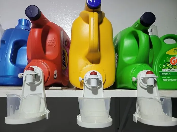 Stay Tidy And Convenient With The <a Style="Display:inline;" Href="Https://Www.amazon.com/Laundry-Detergent-Softener-Dispenser-Organize/Dp/B09mtn8k9z?ie=utf8&linkcode=ll1&tag=bpalpaca-20&linkid=2067ceeb6473cfdf7d6743581fd2dbb8&language=en_us&ref_=as_li_ss_tl" Target="_blank"><span Style="Font: Inherit; Color: #d74b1f;"> Laundry Detergent Cup Holder</Span>, A Clever And Practical Attachment That Hangs From The Nozzle Of Large Detergent Canisters