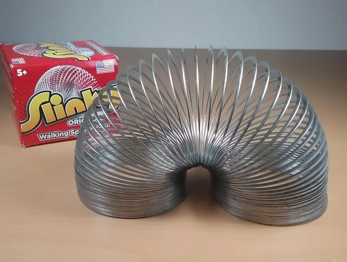 This <a Style="Display:inline;" Href="Https://Www.amazon.com/Original-2-75-Inch-Diameter-Just-Play/Dp/B00000izkx?ie=utf8&th=1&linkcode=ll1&tag=bplamb-20&linkid=cff4a4b1dcff6a73a6dc4caf79ddeb6f&language=en_us&ref_=as_li_ss_tl" Target="_blank"><span Style="Font: Inherit; Color: #d74b1f;"> Original Slinky </Span> Is The Classic Toy That's Been Walking Down Stairs (And Into Our Hearts) For Generations