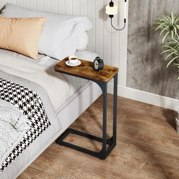 This <a Style="Display:inline;" Href="Https://Www.amazon.com/Qeeig-Shaped-Tables-Bedroom-Farmhouse/Dp/B0bv6kn8q8?crid=1s5vfqvatit15&dib=eyj2ijoimsj9.fgswxrip7b_kb9lon69uwwmdwrcdvkzzwkvb99p4oluu23z7d3o2cnaa5vjudaofe-Xtlenstvufki_gopojvkek-Vghmzeiftkacfg4248zakwzmomiyum2n8fhdm9kefizygswfqnkzyy2oqitqucrbck7icxqzucedylcxcsv37lhikma9wjoyo_h2hihpignj2-2n4bt4cgytaxkmk-Xrxsntnkzoq2mh7vvlzlgqujhhgbpeb84yv4qnupkvb8vhjf0jm3vxcc80ziuy7q1is_psmqa0wnwyzeghfa.6fhkm9zhaqpl-Zueymiitzn6ajikcyol31aksn8b9tc&dib_tag=se&keywords=small%2bapartment%2bfurniture&qid=1732551424&sprefix=small%2bapartment%2bfurnitur%2caps%2c229&sr=8-5&th=1&linkcode=ll1&tag=bpkomodo-20&linkid=4b4e1e390b801473d73aea0a642c2f8a&language=en_us&ref_=as_li_ss_tl" Target="_blank"><span Style="Font: Inherit; Color: #d74b1f;"> C-Shaped Table</Span> Is The Perfect Way To Maximize Your Space (And Your Laziness)! It Slides Right Under Your Couch Or Bed, Giving You A Convenient Surface For Snacks, Drinks, Or Even Your Laptop