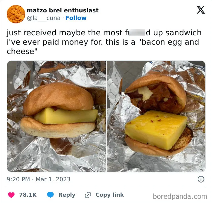 Regrettable spending: disappointing bacon, egg, and cheese sandwich with minimal fillings on a foil wrap.