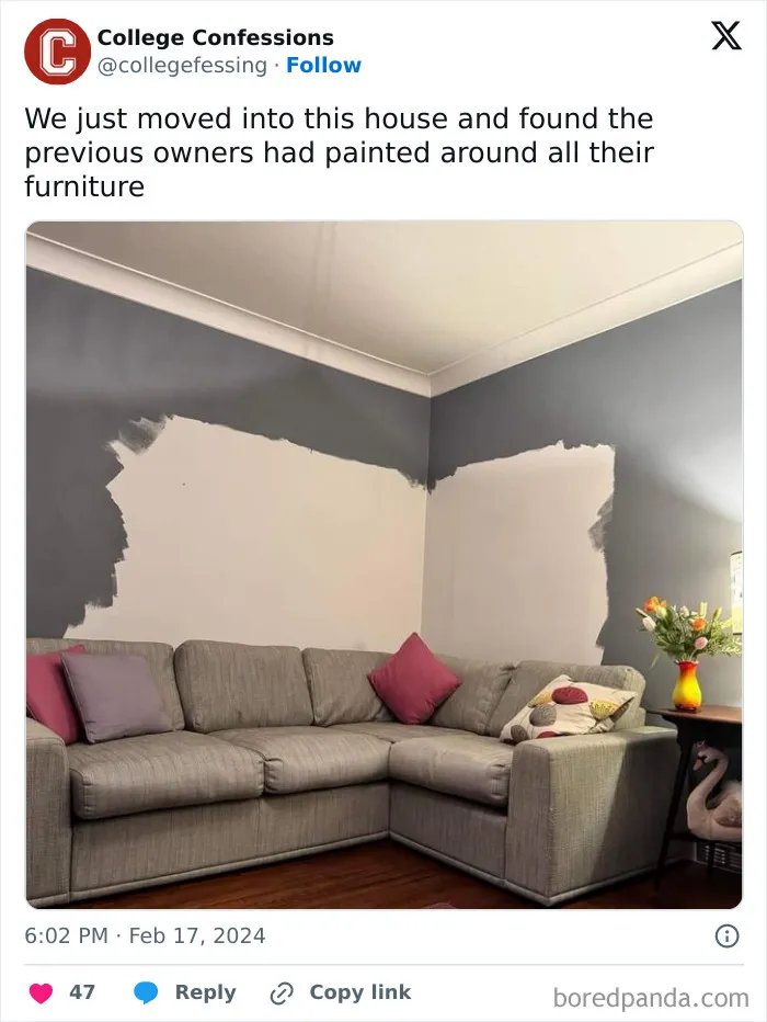 Living room with unpainted walls behind a gray sofa, illustrating regret in spending money on new home decor.