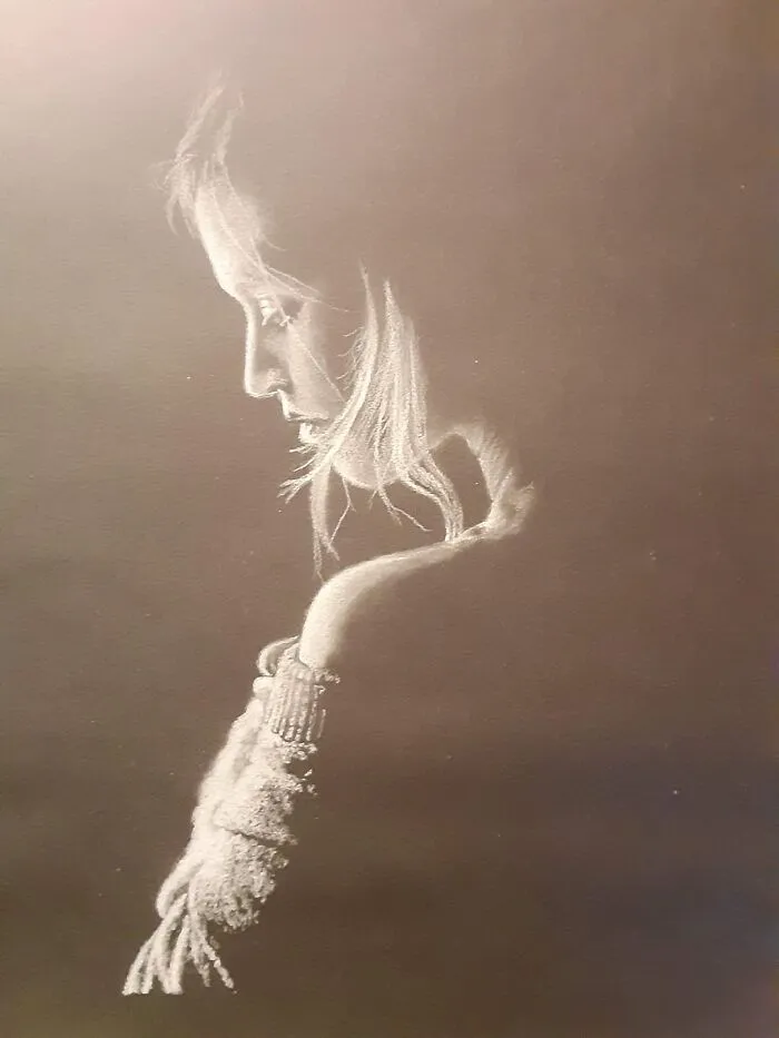 Pastel Of A Woman. White Pastel On Black Paper