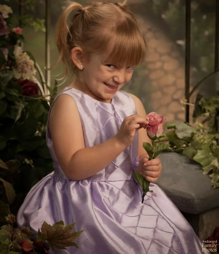 This Picture Was Taken At My Daughter’s Preschool Photo Day. I Think The Photographer Thought Having Her Hold A Flower Would Make For A Really Cute And Innocent Picture