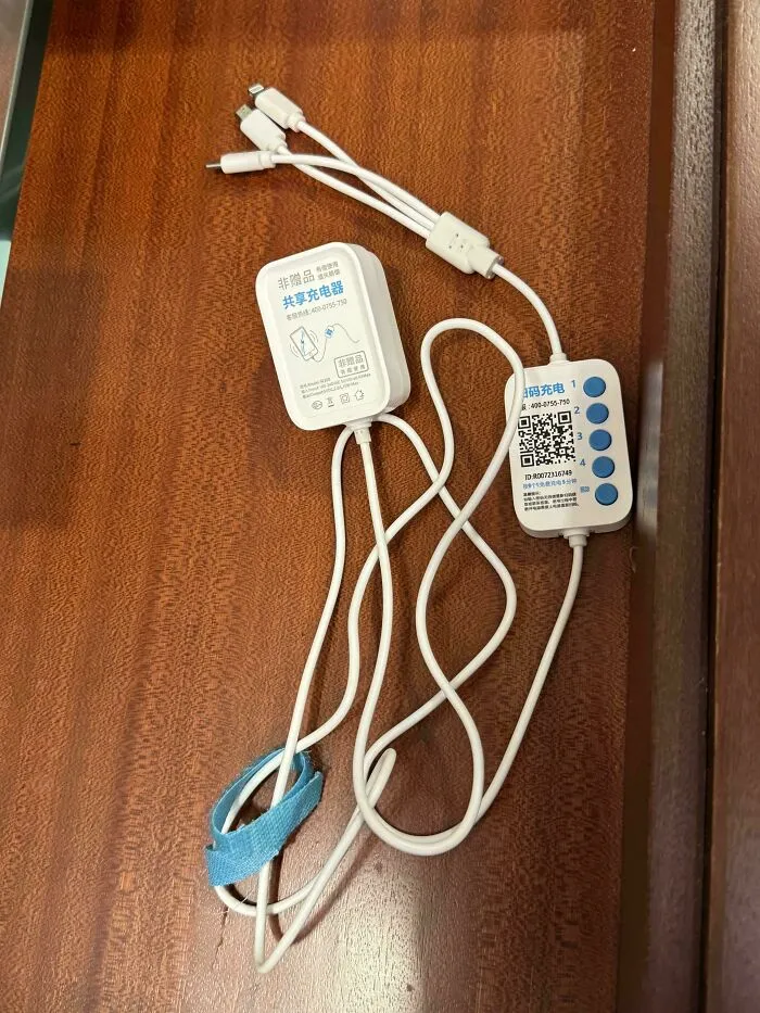 Hotel Charging Cable That Requires You To Register An Account And Sign In With The Qr Code In Order To Work. It Gives You A 5-Minute Free Trial And Then Requires A Fee Per Hour Of Use
