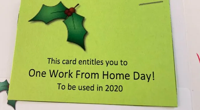 Gift card with holly design offering one work-from-home day in 2020; an example of disappointing presents.