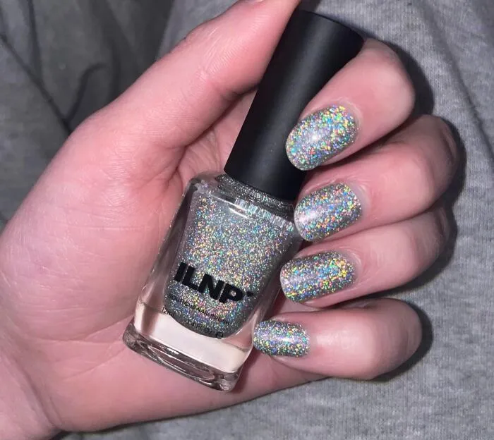 A Gift That's Out Of This World For The Nail Enthusiast! This<a Style="Display:inline;" Href="Https://Www.amazon.com/Ilnp-Mega-Intense-Scattered-Holographic/Dp/B016ncmiwq?ie=utf8&linkcode=ll1&tag=bpemu-20&linkid=7f5803c4f7770e73b1234fcec6b6200d&language=en_us&ref_=as_li_ss_tl" Target="_blank"> <span Style="Font: Inherit; Color: #d74b1f;"> Holographic Nail Polish</Span> Is The Perfect Way To Add Some Magic To Their Manicure, Featuring A Mesmerizing Holographic Effect That Will Make Their Nails Shine Like The Stars