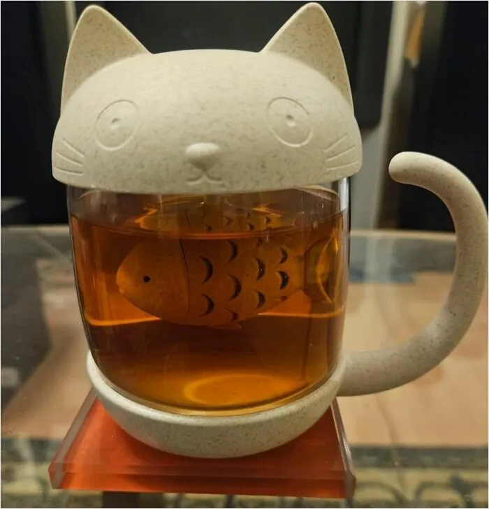 You Are Guaranteed To Purr With Delight Every Time You Reach For  This Kitty <a Style="Display:inline;" Href="Https://Www.amazon.com/Cute-Glass-Infuser-Strainer-Filter/Dp/B078m55l5t?ie=utf8&linkcode=ll1&tag=bpbobcat-20&linkid=64257af35a2fbc76b893137309eb449a&language=en_us&ref_=as_li_ss_tl" Target="_blank"><span Style="Font:inherit;color:#d74b1f;"> Tea Infuser And Mug</Span> 