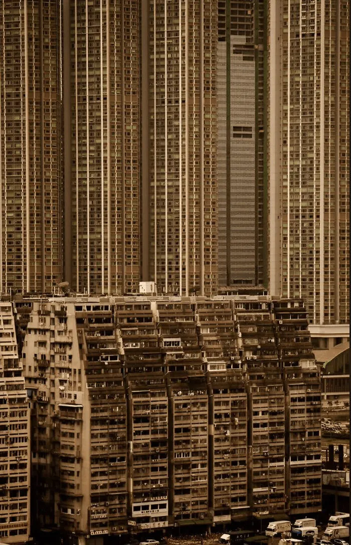 Massive residential buildings tightly packed showcasing extreme size for megalophobia fear of large structures.