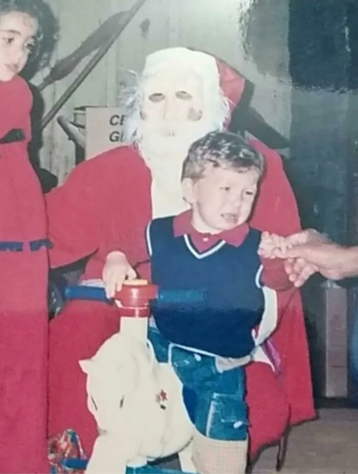 This Is A Picture Of The Day I Discovered Santa Was Not Real In 2004 (My Uncle Had To Take Off The Mask Off Or I Wouldn't Stop Crying). Give Me A Credit, Thas Mask Was Terrifying!