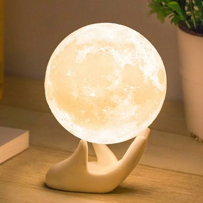 A Celestial Gift For The Mom Who's Out Of This World! This <a Style="Display:inline;" Href="Https://Www.amazon.com/Dp/B074qm7756?ascsubtag=7576661%2c34%2c41%2cd%2c0%2c0%2cbf-Ssrch%2c1236%3a2%3b900%3a2%3b974%3a3%3b1125%3a2%3b1338%3a1%2c41161364%2c0%2c0%2c0&btn_ref=srctok-Fc620a66d486e211&th=1&linkcode=ll1&tag=bpferret-20&linkid=c4c40eea35aeddfe4a072dfdc6d71e5b&language=en_us&ref_=as_li_ss_tl" Target="_blank"><span Style="Font: Inherit; Color: #d74b1f;"> 3D Moon Lamp With Ceramic Base</Span> Is The Perfect Addition To Her Personal Space, Casting A Warm And Gentle Glow That's Simply Lunar-Ly Beautiful