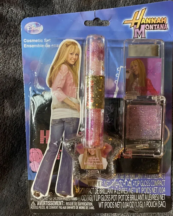 Hannah Montana cosmetic set with lip gloss and glitter, an unexpected Christmas present that ruined holiday spirit.