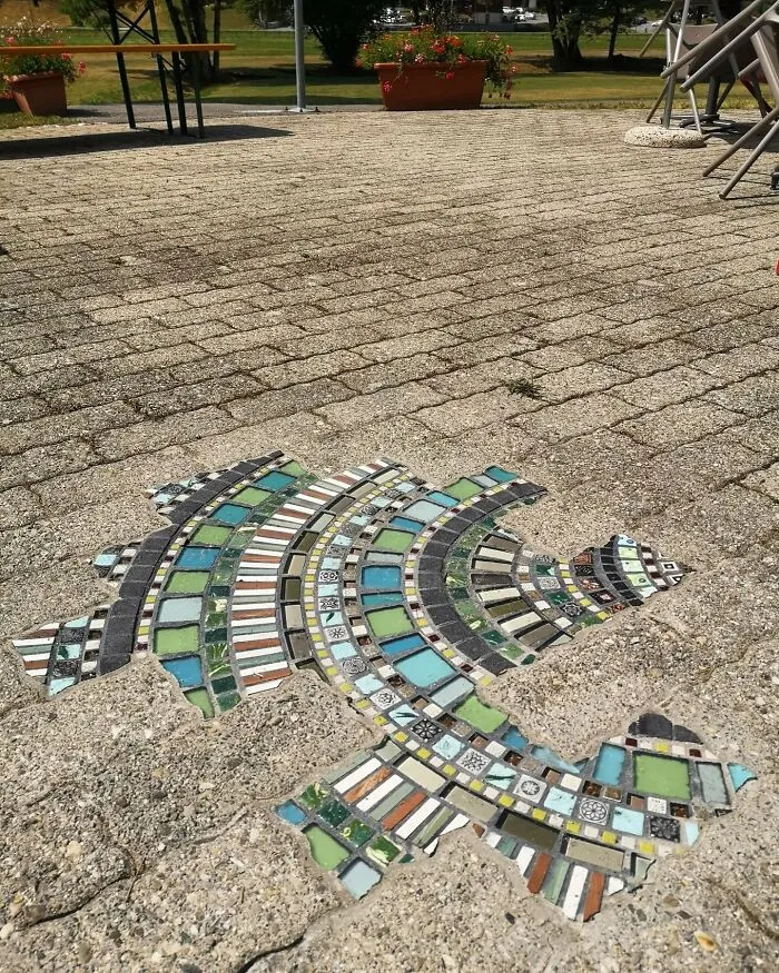Artist Mends Cracked Sidewalks, Potholes, And Buildings Using Vibrant Mosaics (30 New Pics)