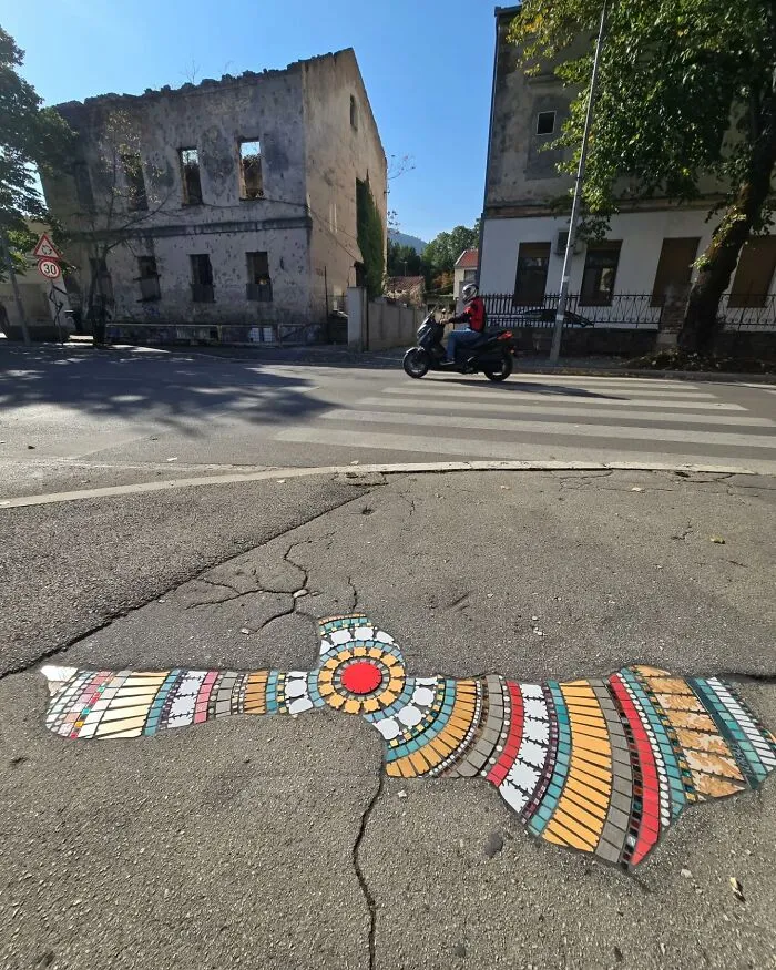 Artist Mends Cracked Sidewalks, Potholes, And Buildings Using Vibrant Mosaics (30 New Pics)