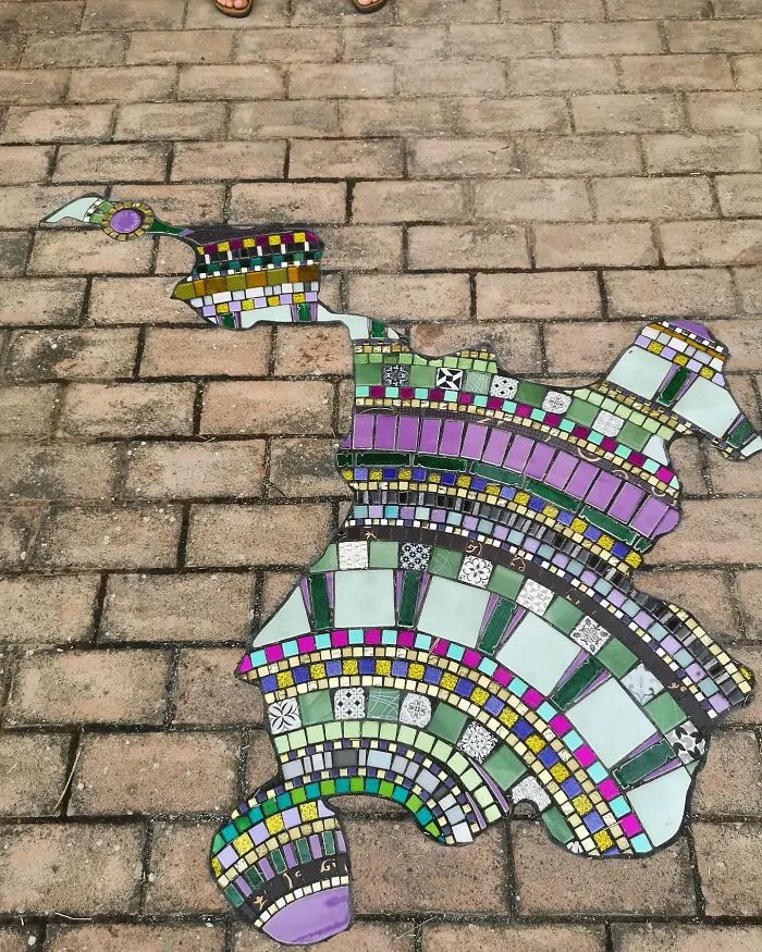 Artist Mends Cracked Sidewalks, Potholes, And Buildings Using Vibrant Mosaics (30 New Pics)