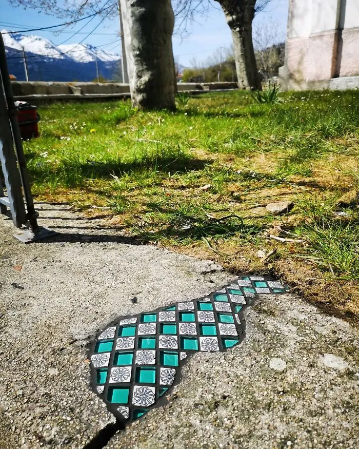 Artist Mends Cracked Sidewalks, Potholes, And Buildings Using Vibrant Mosaics (30 New Pics)