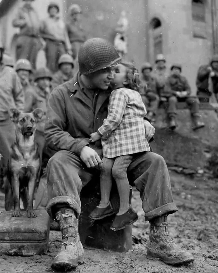 A Little French Girl Gives An American Soldier A Kiss On Valentine’s Day, 1945
