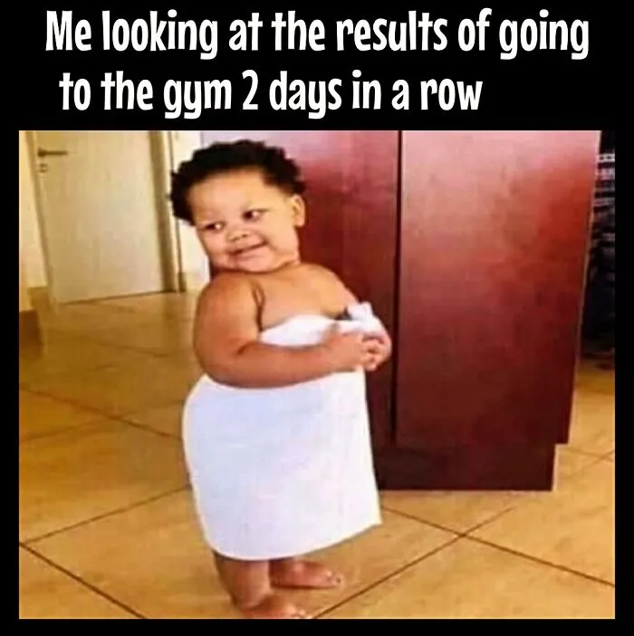 Child wrapped in a towel playfully smirking, illustrating the humor in dieting frustrations.