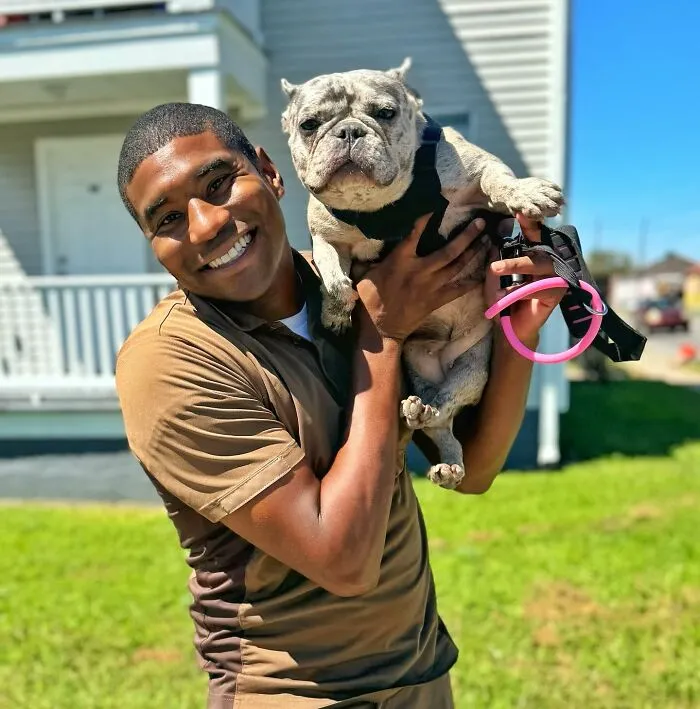 This UPS Driver's 21 New Photos With Pets Are The Dose Of Wholesome Content You Need