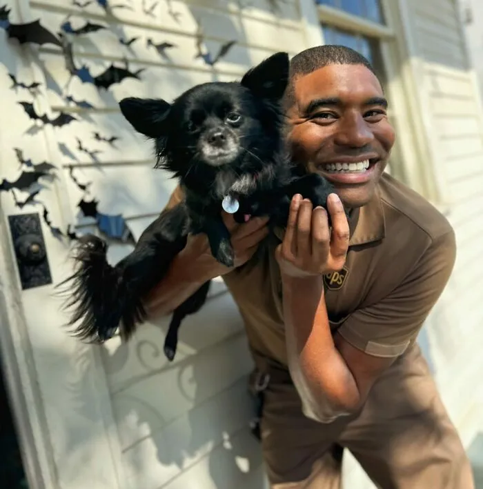 This UPS Driver's 21 New Photos With Pets Are The Dose Of Wholesome Content You Need