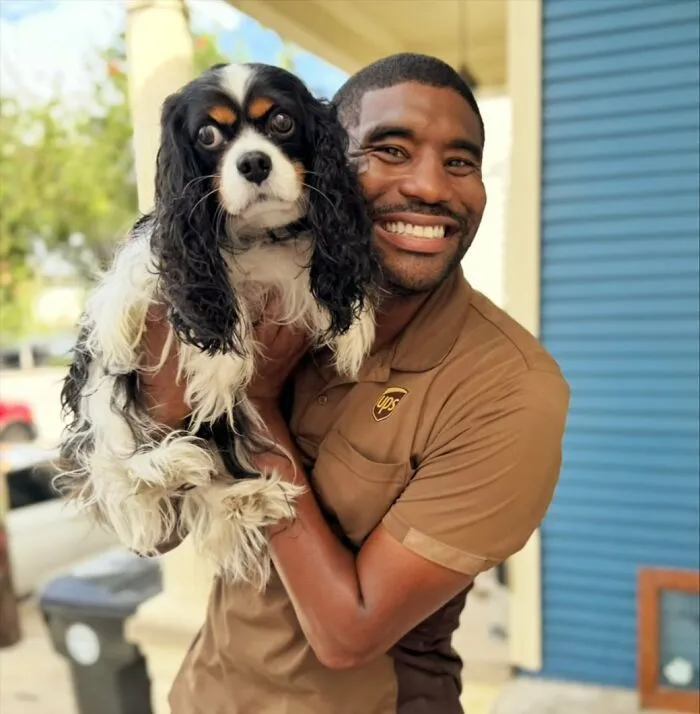 This UPS Driver's 21 New Photos With Pets Are The Dose Of Wholesome Content You Need