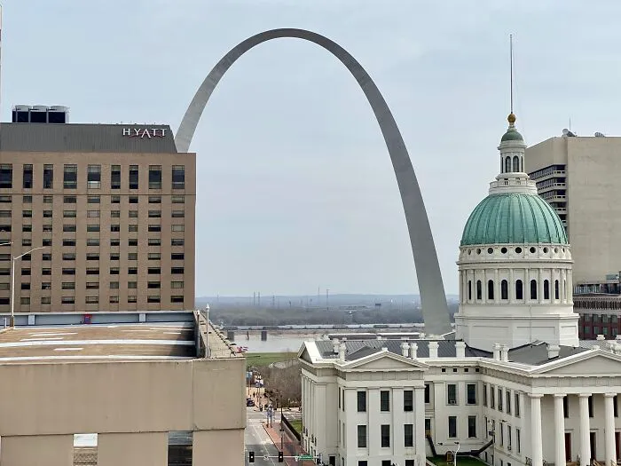 St. Louis arch with surrounding buildings, showcasing amazing views of states.
