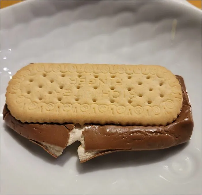 My Daughter Just Invented The British S'more. Milky Way Between 2 Rich Tea Fingers. Microwaved For 15 Seconds. It's So Wrong It's Right