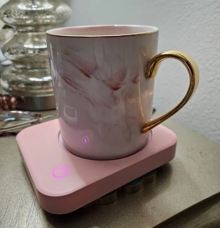 Keep Your Caffeine Fix Piping Hot With The <a Style="Display:inline;" Href="Https://Www.amazon.com/Vobaga-Shut-Off-Temperature-Settings-Electric/Dp/B07sw28lbr?ie=utf8&th=1&linkcode=ll1&tag=bpkomodo-20&linkid=c234d0fad872602678106e1677727a0a&language=en_us&ref_=as_li_ss_tl" Target="_blank"><span Style="Font: Inherit; Color: #d74b1f;"> Coffee Mug Warmer </Span>. This Desktop Dynamo Ensures Your Coffee Stays At The Perfect Temp, Even When You Get Distracted By Emails, Meetings, Or The Occasional Cat Video